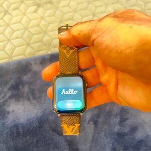 Apple Smartwatch with Brown LV Strap. Great condition. 
Ty